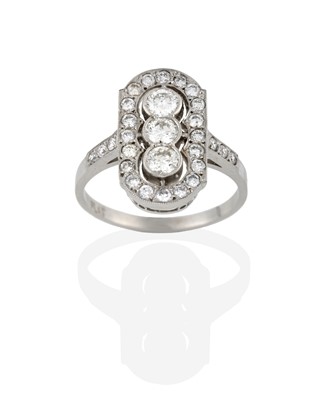 Lot 2354 - An Art Deco Style Diamond Ring, three round...