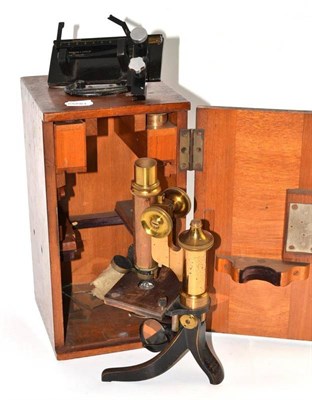 Lot 236 - A cased microscope