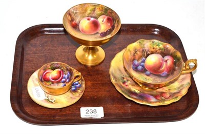 Lot 238 - Small fruit painted Worcester cup and saucer by W Hale (reglued), another fruit painted cup and...