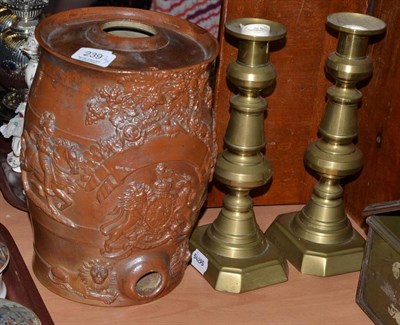 Lot 239 - Nottingham brown stoneware spirit barrel circa 1830 and a pair of Victorian brass candlesticks