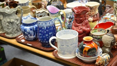 Lot 255 - Three trays of 19th century and later jugs, Toby jugs, etc