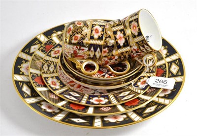 Lot 266 - Three Royal Crown Derby cups and saucers and three Royal Crown Derby plates