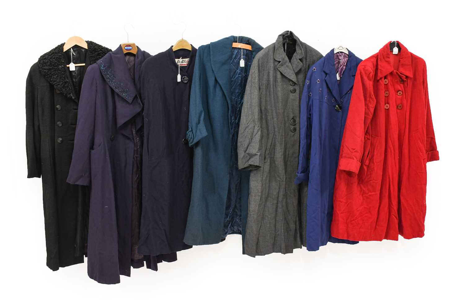 Lot 2046 - Circa 1940/50s Ladies' Coats, comprising a red...