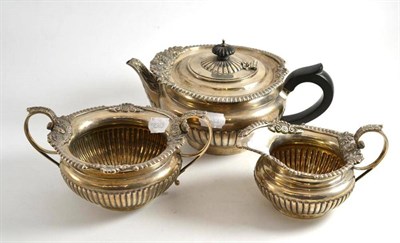 Lot 275 - Silver three piece composite tea set, 1916 and later