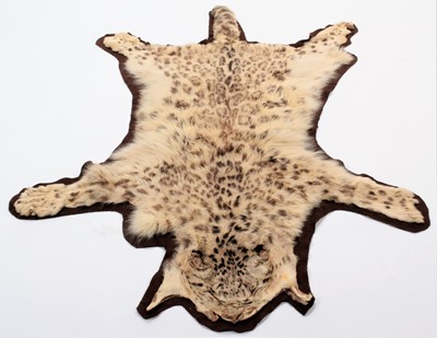 Lot 193 - Taxidermy: A Pair of Snow Leopard Rugs...