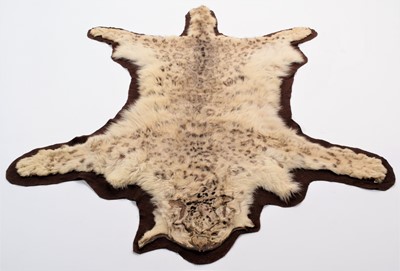 Lot 193 - Taxidermy: A Pair of Snow Leopard Rugs...