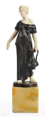 Lot 909 - Hans Keck (German): A Patinated Bronze and Ivory Figure, modelled as a classical maiden...