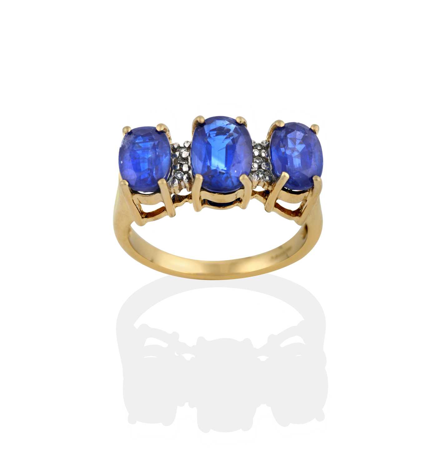 Lot 2381 - A 9 Carat Gold Sapphire and Diamond Ring