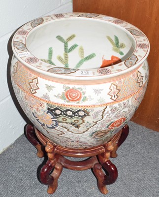 Lot 212 - Reproduction Chinese fish bowl on a stand.