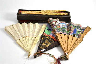 Lot 302 - Two pierced ivory fans, two Chinese painted fans on lacquered and sandalwood sticks and guards (4)