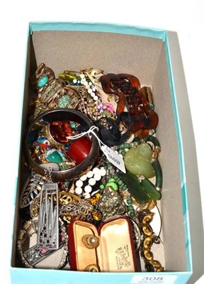 Lot 308 - A group lot of costume jewellery including necklaces and brooches by Trifari, etc