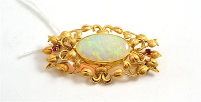 Lot 325 - An opal and ruby set leaf motif brooch, stamped '18ct'