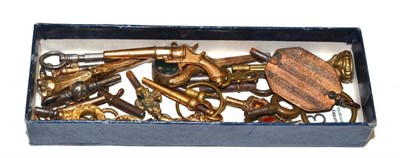 Lot 329 - A collection of watch keys including novelty gun examples etc