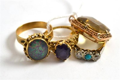 Lot 335 - Opal ring, amethyst ring, another ring and a pendant