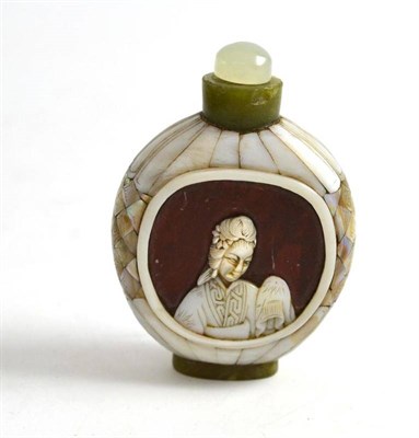 Lot 336 - A Chinese mother-of-pearl green hardstone snuff bottle