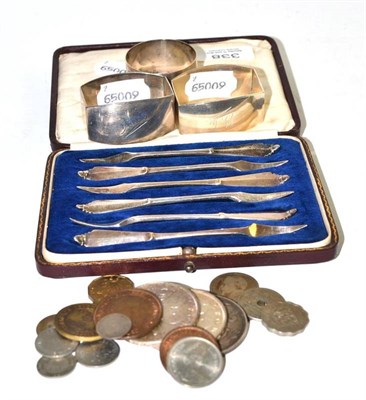 Lot 338 - Cased set of six silver picks, three silver napkin rings, three Crowns and mixed coins