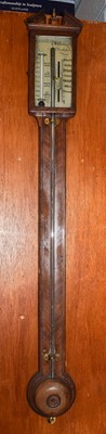 Lot 583 - An early 19th century mahogany stick barometer,...