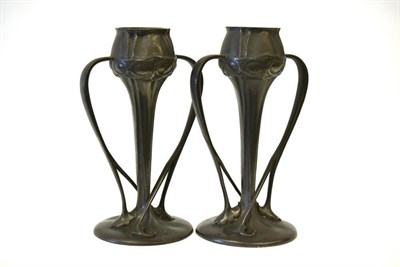 Lot 915 - Archibald Knox or Oliver Baker For Liberty & Co.: A Pair of  "Tudric " Pewter Vases, circa...