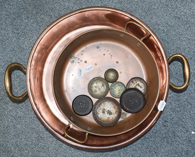 Lot 297 - A 19th century shallow copper cooking pot with...