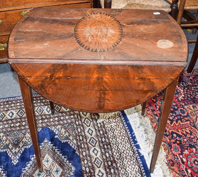 Lot 548 - A George III mahogany Pembroke table inlaid...