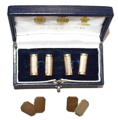 Lot 131 - A pair of Elizabeth II 9 carat gold cufflinks;...