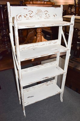 Lot 539 - A white-painted folding bookcase; together...