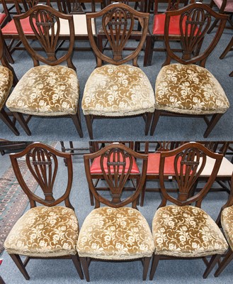 Lot 503 - A set of six mahogany shield back dining chairs