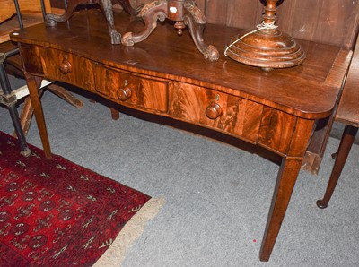 Lot 465 - A George III mahogany serpentine fronted...