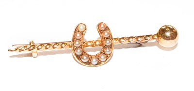 Lot 115 - A split pearl horseshoe motif bar brooch,...