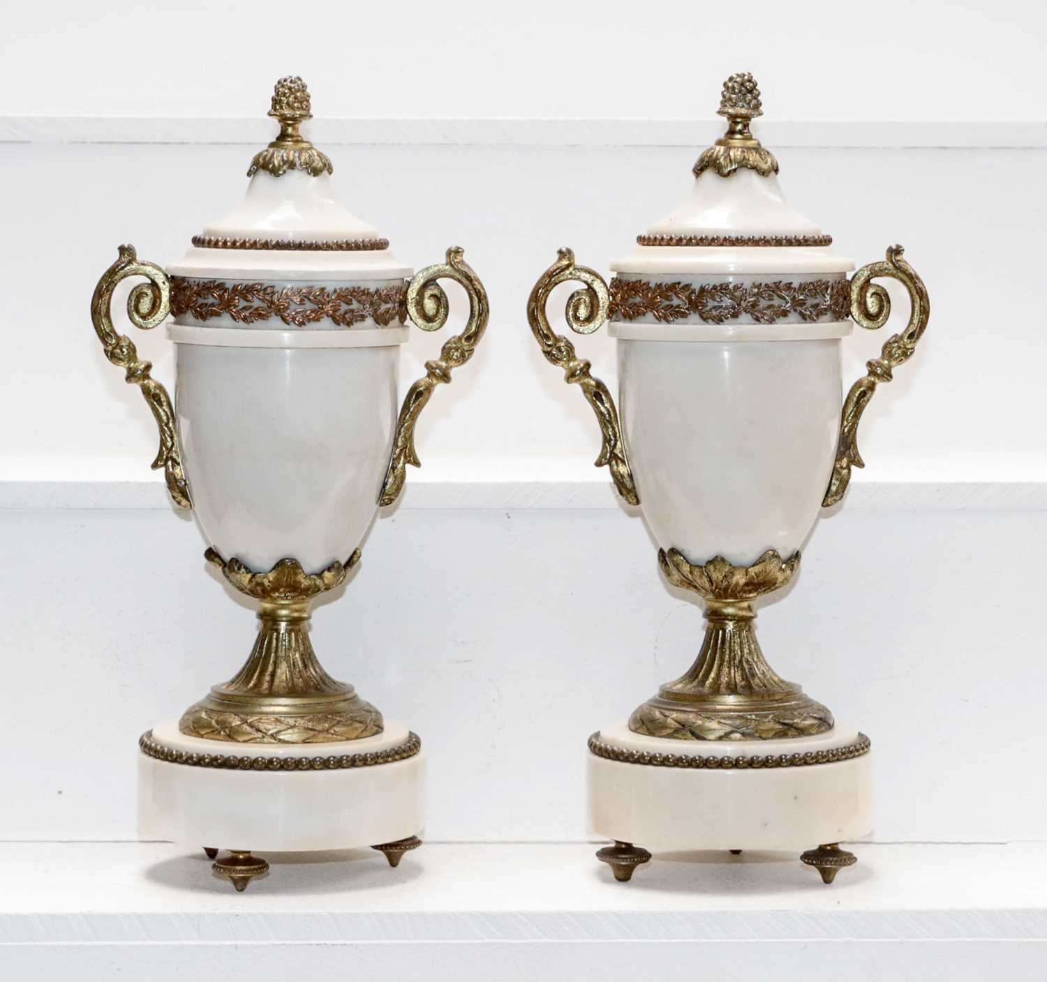 Lot 19 - A pair of early 20th century white marble and...