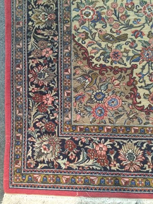 Lot 344 - Ghom rug, the ivory field of birds and vines...