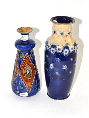 Lot 384 - A Royal Doulton stoneware vase with Art Nouveau style decoration and another