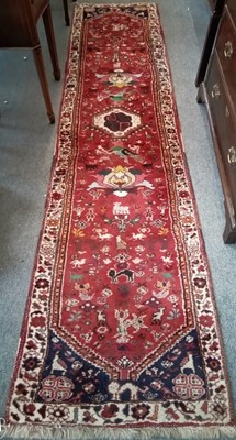 Lot 340 - Kashgai runner, the crimson field with a one...