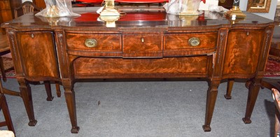 Lot 495 - A 19th century mahogany breakfront bow front...