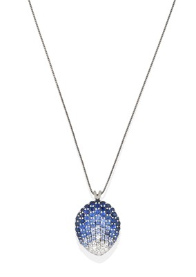 Lot 2404 - A Sapphire and Diamond Pendant on Chain