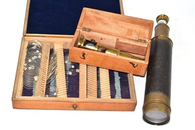 Lot 400 - A brass four draw telescope, a microscope etc