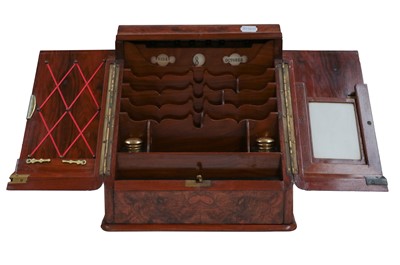 Lot 254 - A Victorian figured walnut stationery cabinet,...