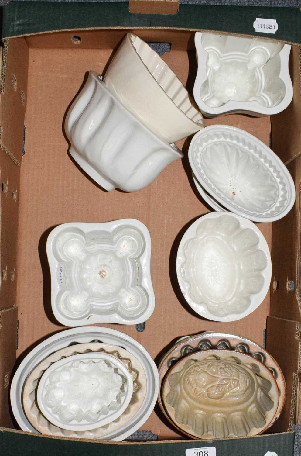 Lot 308 - A group of Victorian pottery jelly moulds some...