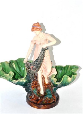 Lot 411 - A majolica fisherwoman