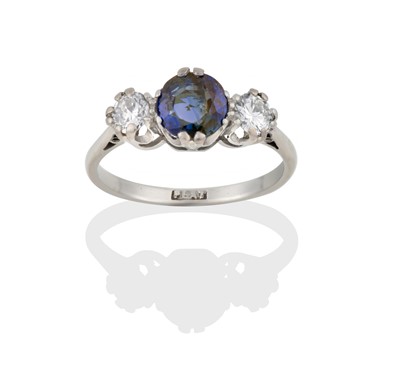 Lot 2414 - A Sapphire and Diamond Three Stone Ring