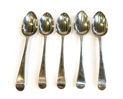 Lot 208 - Two pairs of George III silver tablespoons and...