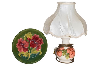 Lot 4 - A Walter Moorcroft coral hibiscus lamp and a...