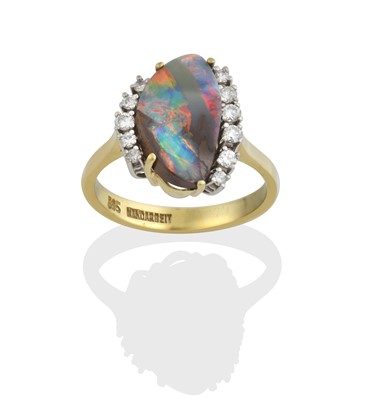 Lot 2334 - An Opal and Diamond Ring