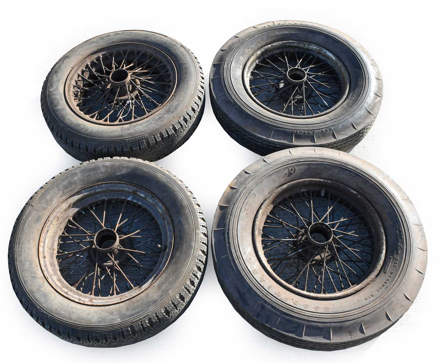 Lot 64 - A Set of Four 16" Wire Wheels, with rubber...