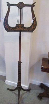 Lot 114 - A Regency Style Ebonised and Parcel-Gilt Music...