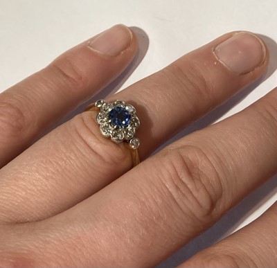 Lot 68 - A blue topaz and diamond cluster ring, stamped...
