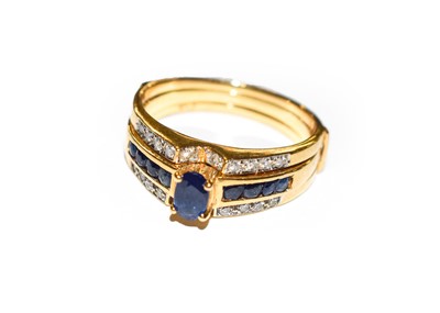 Lot 176 - A sapphire and diamond ring, stamped ‘750’,...