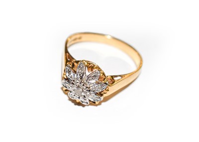 Lot 115 - An 18 carat gold diamond cluster ring, finger...