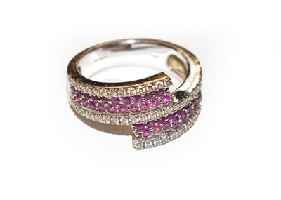 Lot 179 - An 18 carat white gold pink sapphire and...