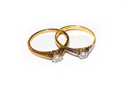 Lot 173 - A 9 carat gold diamond solitaire ring, finger...